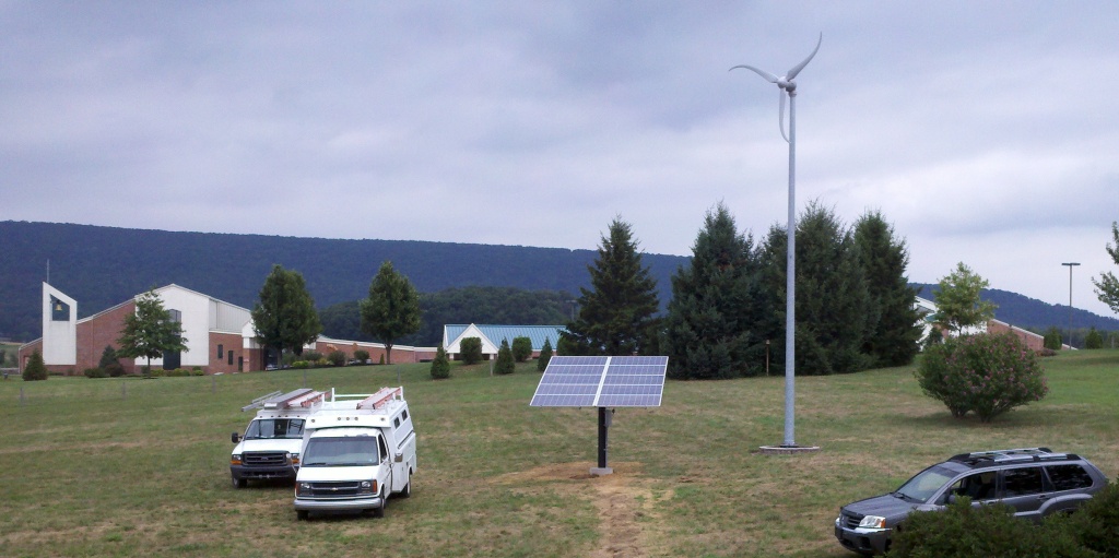 2.4kW Ground Mount solar array next to Skystream 3.7 near Hamburg